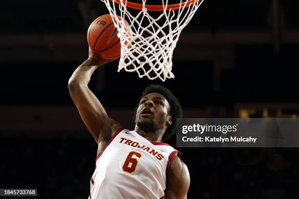 Bronny James of the USC Trojans dunks the ball during warm ups prior to a game against the Long Beach State 49ers at Galen Center on December 10,...