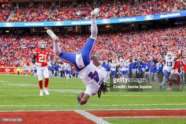 James Cook of the Buffalo Bills reacts after scoring a touchdown during the first half of the game against the Kansas City Chiefs at GEHA Field at...