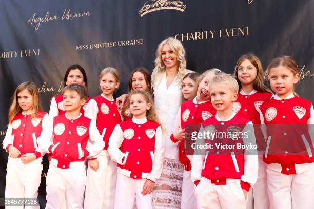 Monaco Children's Choir attend charity event hosted by Miss Universe Ukraine 2023 Angelina Usanova on December 10, 2023 in Nice, France.