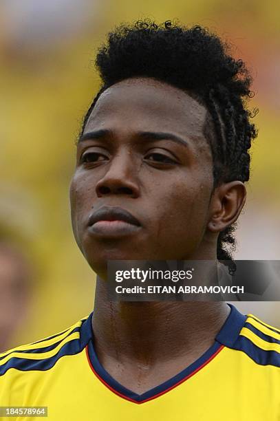 Colombian football player Carlos Sanchez is pictured before the start of the Brazil 2014 FIFA World Cup South American qualifier match against Chile,...