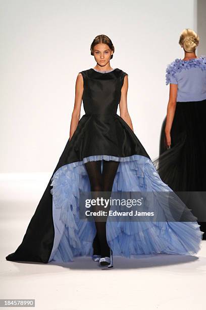 Model walks the runway at the Zang Toi fashion show during Mercedes-Benz Fashion Week Spring 2014 at The Stage at Lincoln Center on September 10,...