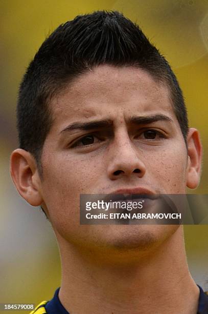 Colombian football player James Rodriguez is pictured before the start of the Brazil 2014 FIFA World Cup South American qualifier match against...