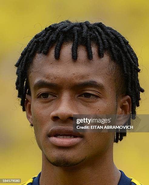 Colombian football player Juan Guillermo Cuadrado is pictured before the start of the Brazil 2014 FIFA World Cup South American qualifier match...