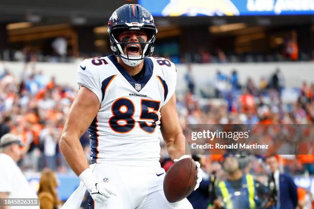 Lucas Krull of the Denver Broncos celebrates a pass reception during the second quarter against the Los Angeles Chargers at SoFi Stadium on December...