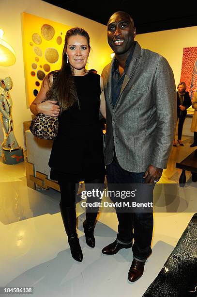 Sol Campbell and Fiona Barratt attend the Moet Hennessy London Prize Jury Visit during the PAD London Art + Design Fair at Berkeley Square Gardens on...