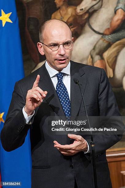 Italian Prime Minister Enrico Letta gestures as he attends a meeting with the Jewish Community to commemorate the 70th anniversary of the deportation...