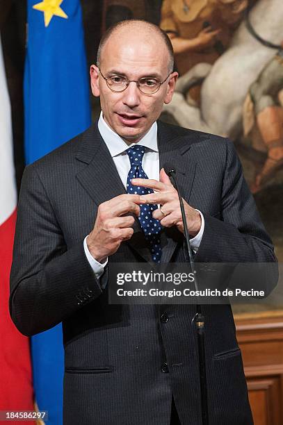 Italian Prime Minister Enrico Letta gestures as he attends a meeting with the Jewish Community to commemorate the 70th anniversary of the deportation...