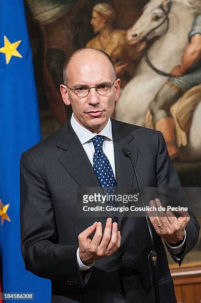 Italian Prime Minister Enrico Letta gestures as he attends a meeting with the Jewish Community to commemorate the 70th anniversary of the deportation...