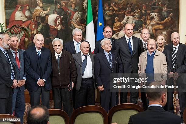 Members of Jewish Community and Italian Prime Minister Enrico Letta pose for a photo at the end of a meeting with the Jewish Community to commemorate...