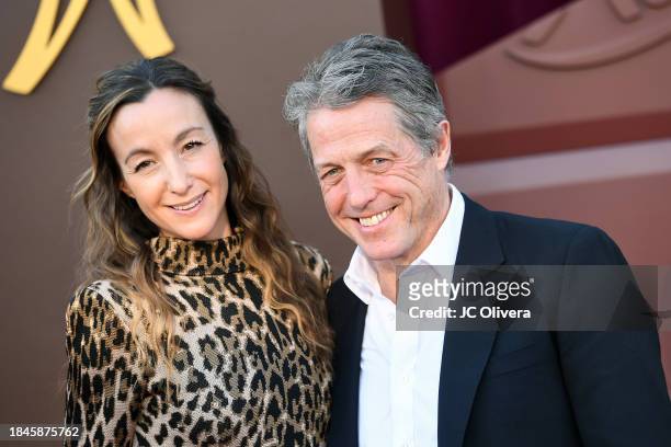 Anna Elisabet Eberstein and Hugh Grant attend Los Angeles Premiere of Warner Bros. "Wonka" at Regency Village Theatre on December 10, 2023 in Los...