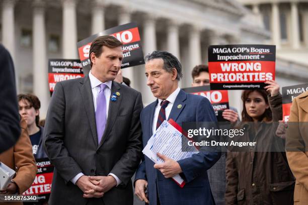 Rep. Dan Goldman speaks with Rep. Jamie Raskin during a news conference about Republican efforts to open an impeachment inquiry into U.S. President...