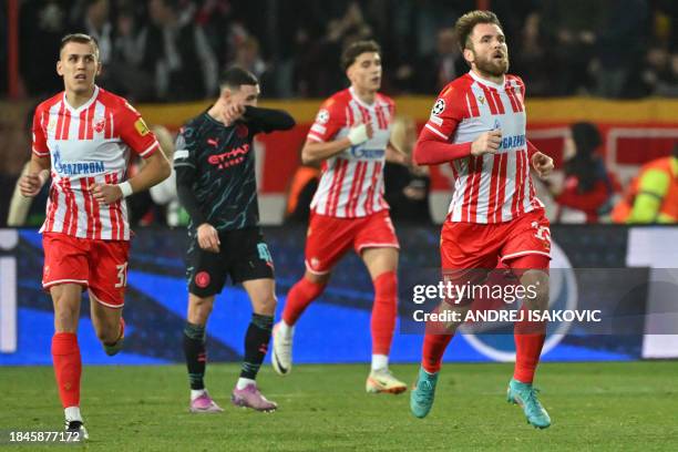 Red Star's Serbian midfielder Aleksandar Katai reacts after scoring his team's second goal during the UEFA Champions League Group G day 6 group stage...