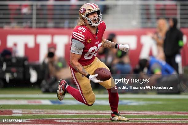 George Kittle of the San Francisco 49ers celebrates after a touchdown during the fourth quarter in the game against the Seattle Seahawks at Levi's...