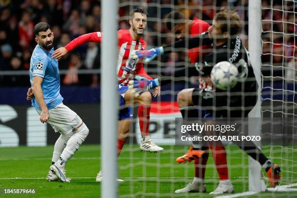 Atletico Madrid's Spanish defender Mario Hermoso scores the second goal of the match which eventually was disallowed during the UEFA Champions League...