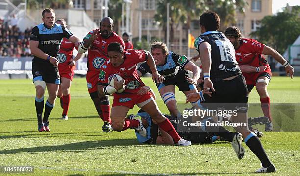 Chris Masoe of Toulon breaks with the ball during the Heineken Cup Pool 2 match between Toulon and Glasgow Warriors at the Felix Mayol Stadium on...