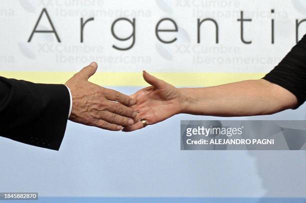 Argentine President Cristina Fernandez de Kirchner greets Brazilian President Luiz Inacio Lula Da Silva during the XX Ibero-American Summit on...