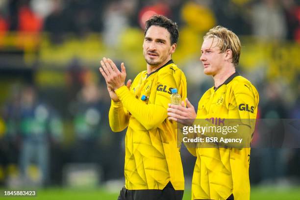 Mats Hummels of Borussia Dortmund and Julian Brandt of Borussia Dortmund applaud after the UEFA Champions League Group F match between Borussia...
