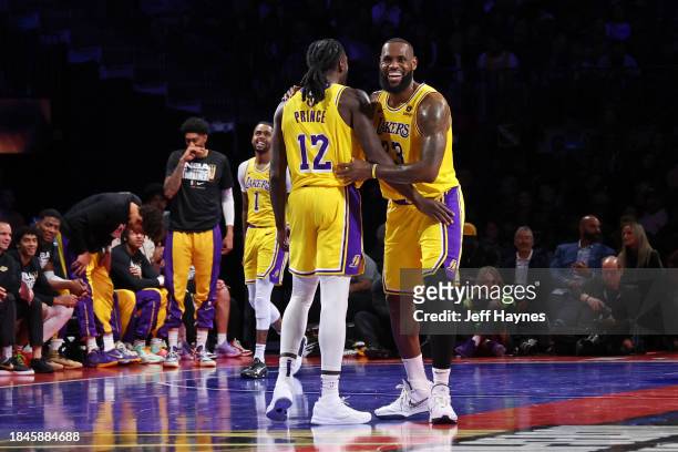 LeBron James and Taurean Prince of the Los Angeles Lakers embrace during the game against the New Orleans Pelicans during the semifinals of the...