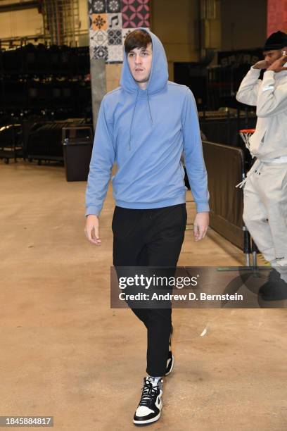 Austin Reaves of the Los Angeles Lakers arrives to the arena before the game against the San Antonio Spurs on December 13, 2023 at the Frost Bank...