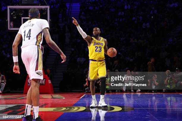 LeBron James of the Los Angeles Lakers signals during the game against the New Orleans Pelicans during the semifinals of the In-Season Tournament on...