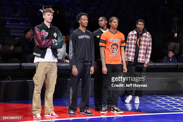 Ron Holland, Babacar Sane, Thierry Darlan and Matas Buzelis of the G League Ignite look on before the game between the New Orleans Pelicans and Los...