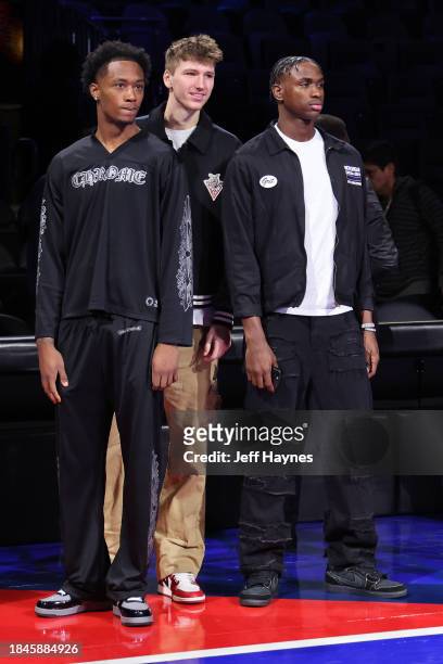 Ron Holland, Babacar Sane, and Matas Buzelis of the G League Ignite look on before the game between the New Orleans Pelicans and Los Angeles Lakers...