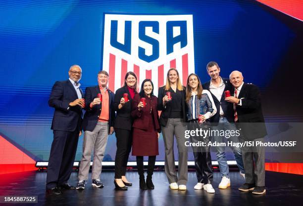 Dayrl Hicks, Pat Wilson, Jennifer Mann, Bea Perez, Cindy Parlow Cone, Kelley O'Hara, JT Batston, and Dan Cathey pose on stage at Town Stage at...
