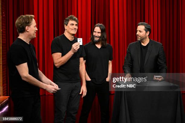 Episode 1890 -- Pictured: Bret Domrose, Robert Mailhouse, and Keanu Reeves of musical guest Dogstar with illusionist David Blaine during a magic demo...