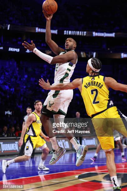 Khris Middleton of the Milwaukee Bucks shoots the ball during the game against the Indiana Pacers during the semifinals of the In-Season Tournament...