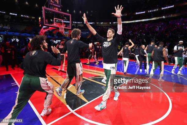 Brook Lopez of the Milwaukee Bucks celebrates before the game against the Indiana Pacers during the semifinals of the In-Season Tournament on...