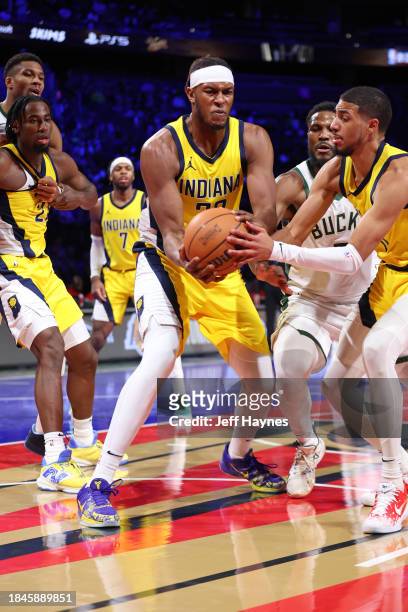 Myles Turner of the Indiana Pacers rebounds during the game against the Milwaukee Bucks during the semifinals of the In-Season Tournament on December...