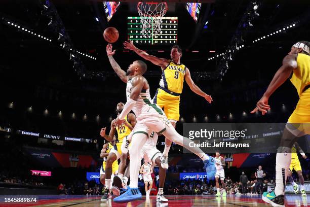 Damian Lillard of the Milwaukee Bucks drives to the basket during the game against the Indiana Pacers during the semifinals of the In-Season...