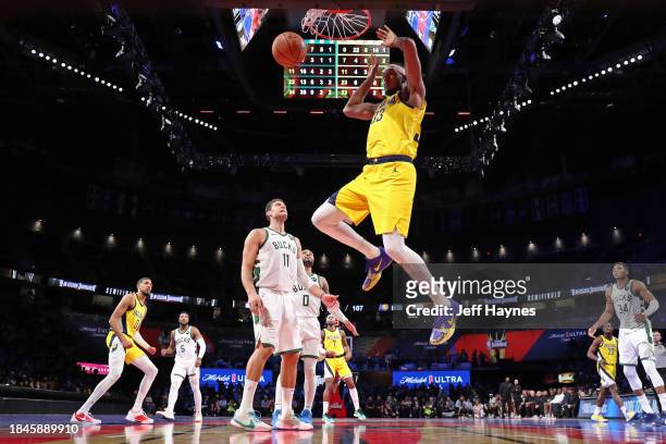Myles Turner of the Indiana Pacers dunks the ball during the game against the Milwaukee Bucks during the semifinals of the In-Season Tournament on...