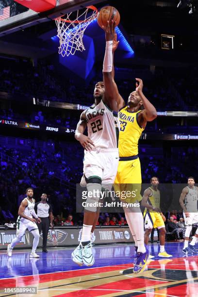 Khris Middleton of the Milwaukee Bucks drives to the basket during the game against the Indiana Pacers during the semifinals of the In-Season...