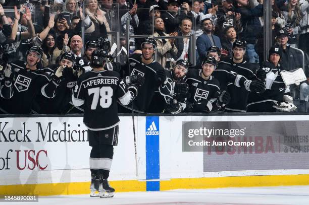 Alex Laferriere of the Los Angeles Kings celebrates his goal with teammates during the first period against the Winnipeg Jets at Crypto.com Arena on...