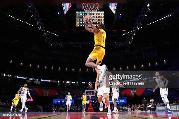 Obi Toppin of the Indiana Pacers dunks the ball during the game against the Milwaukee Bucks during the semifinals of the In-Season Tournament on...