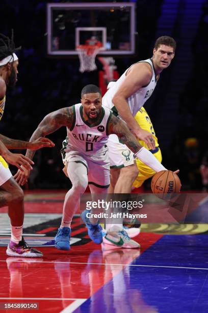 Damian Lillard of the Milwaukee Bucks drives to the basket during the game against the Indiana Pacers during the semifinals of the In-Season...