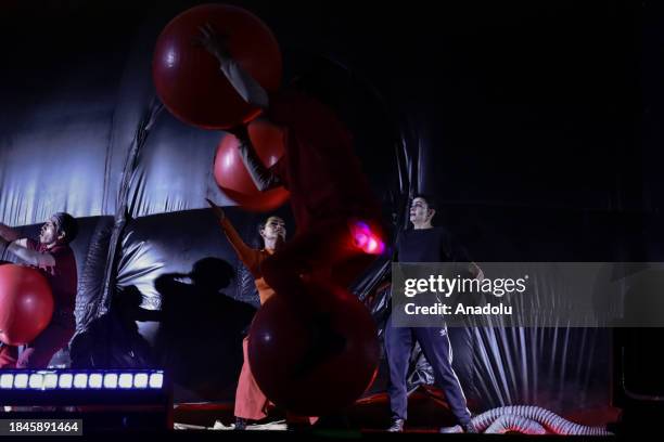 Artists perform their talents during the Christmas performance of 'Constelaciones' at the Plaza de Bolivar in Bogota, Colombia on December 13, 2023....