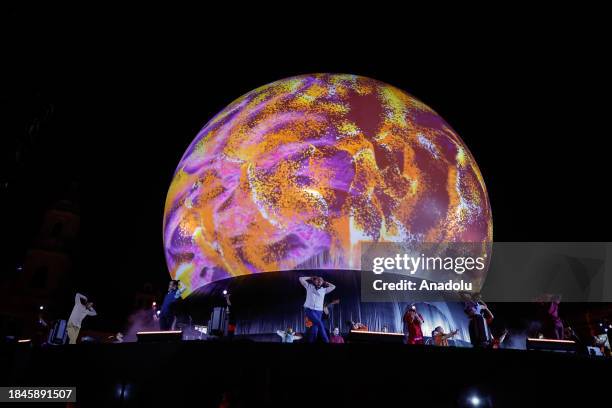 Artists perform their talents during the Christmas performance of 'Constelaciones' at the Plaza de Bolivar in Bogota, Colombia on December 13, 2023....