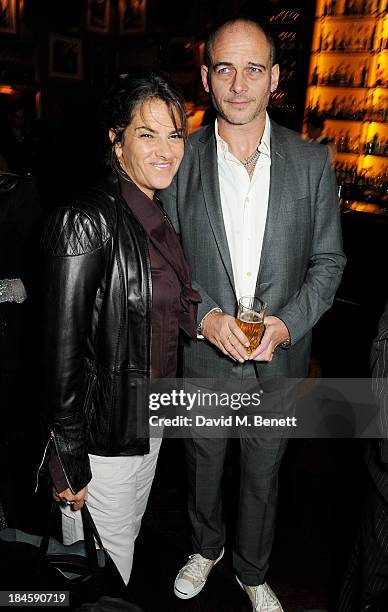 Tracey Emin and Dinos Chapman attend the London EDITION and NOWNESS dinner to celebrate ON COLLABORATION on October 14, 2013 in London, England.