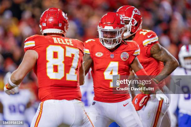 Rashee Rice of the Kansas City Chiefs reacts with Travis Kelce after scoring a touchdown during the second half of the game against the Buffalo Bills...