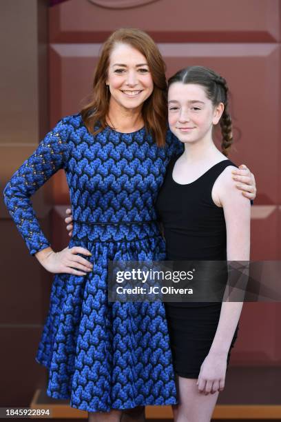Alyson Hannigan and Satyana Marie Denisof attend Los Angeles Premiere of Warner Bros. "Wonka" at Regency Village Theatre on December 10, 2023 in Los...