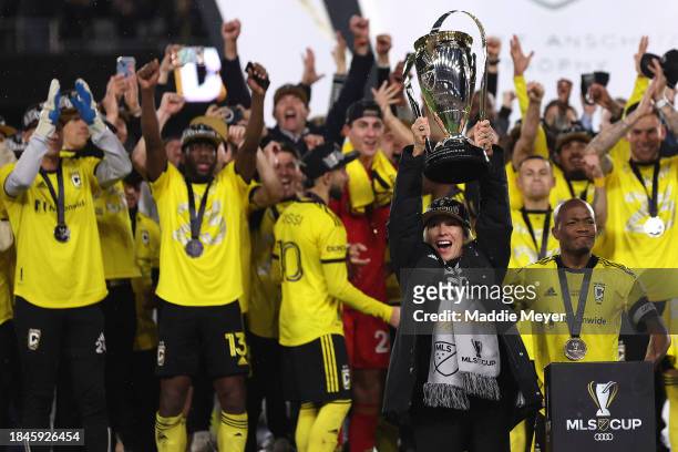 Columbus Crew owner Dee Haslam lifts the Philip F. Anschutz Trophy after the 2023 MLS Cup between the Los Angeles FC and the Columbus Crew at...
