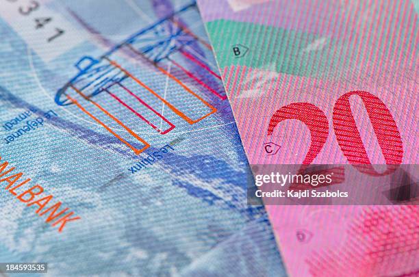 swiss currency francs - franken stockfoto's en -beelden