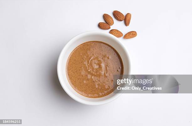 almond butter mit mandeln - mandeln stock-fotos und bilder