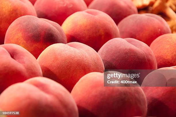 fresh peaches at pike place market - peach stock pictures, royalty-free photos & images