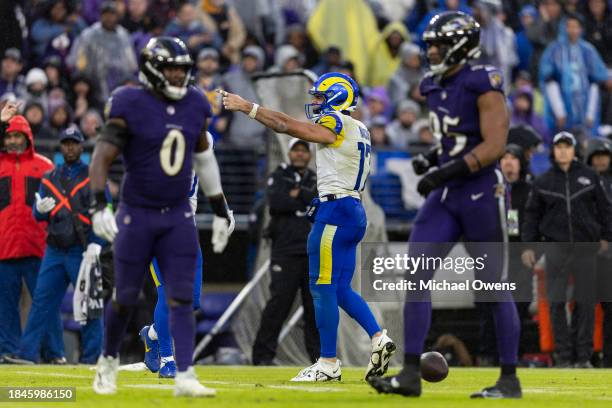 Puka Nacua of the Los Angeles Rams celebrates after completing a diving catch during an NFL football game between the Baltimore Ravens and the Los...