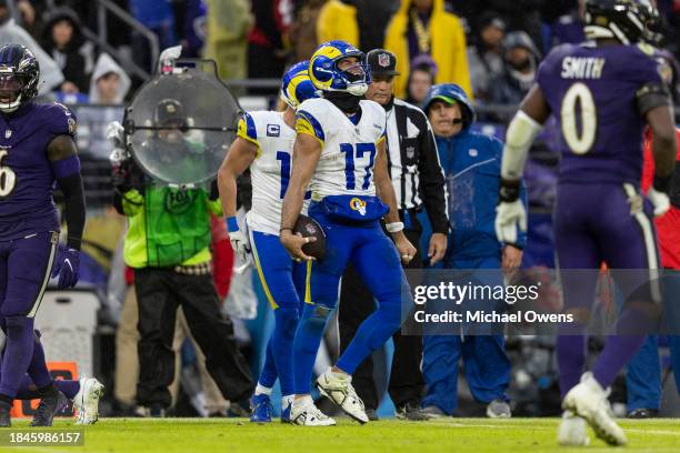 Puka Nacua of the Los Angeles Rams celebrates after completing a diving catch during an NFL football game between the Baltimore Ravens and the Los...