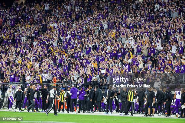 Fans cheer during the game between the Minnesota Vikings and the Las Vegas Raiders at Allegiant Stadium on December 10, 2023 in Las Vegas, Nevada.