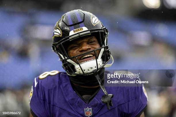 Lamar Jackson of the Baltimore Ravens reacts as he warms up prior to an NFL football game between the Baltimore Ravens and the Los Angeles Rams at...